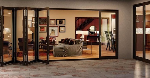 Large bi-fold glass doors in a San Jose, CA home, maximizing natural light and outdoor views.