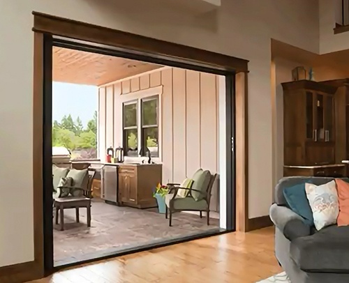 Living room with a sliding glass pocket door in San Jose, CA, combining style and functionality.